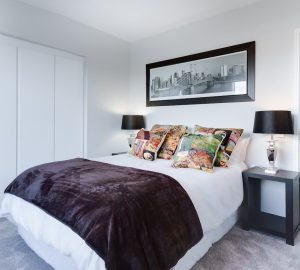Minimalist monochome bedroom with design symmetry