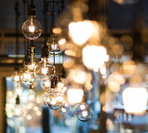 Retro light bulbs hanging from the ceiling on long cables