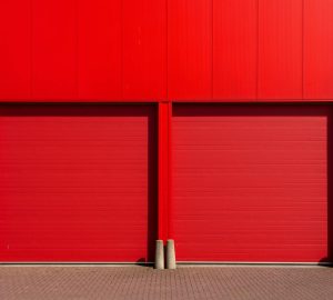 Red garage doors to storage area