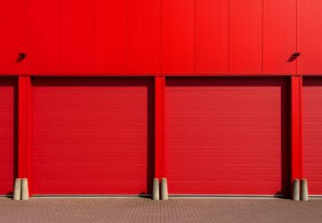 Red garage doors to storage area