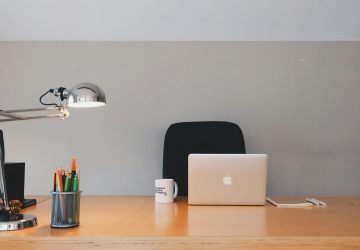 Work desk with silver apple laptop