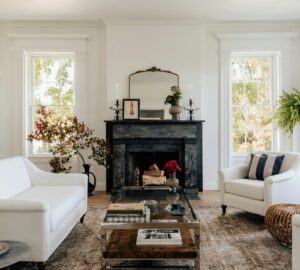 Lounge with white sofa and black fire surround
