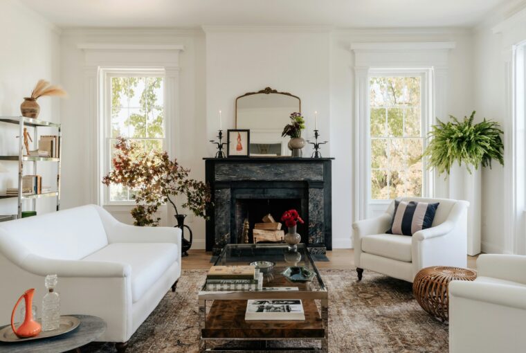 Lounge with white sofa and black fire surround